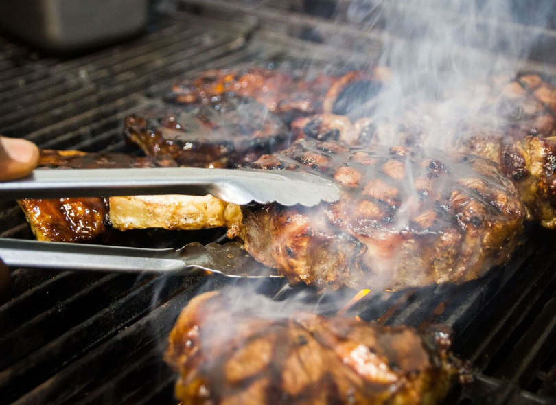 Braaing steak over natural gas at Little Savanna, Palmerston North.