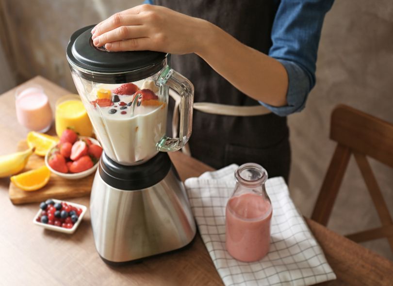 Blender with smoothie ingredients.