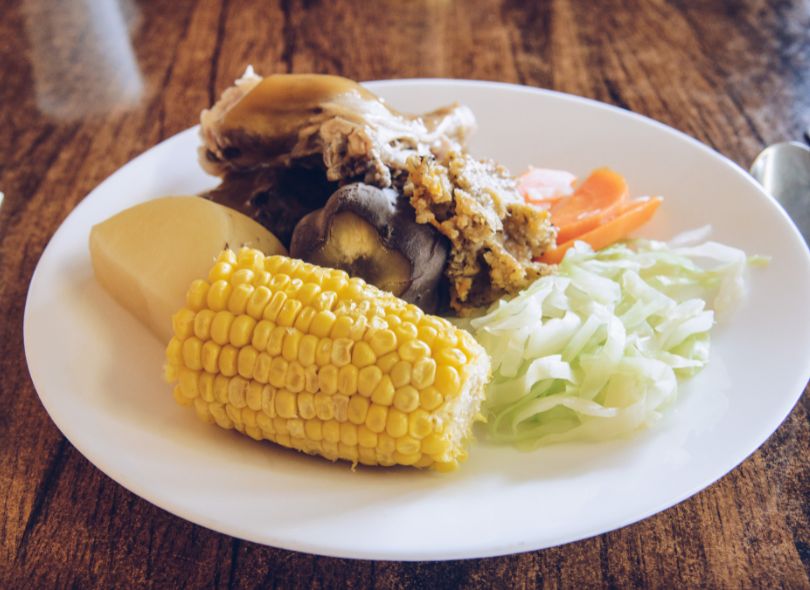 Hāngī food on a plate