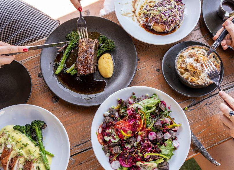 Table of delicious food at Meat and Liquor.