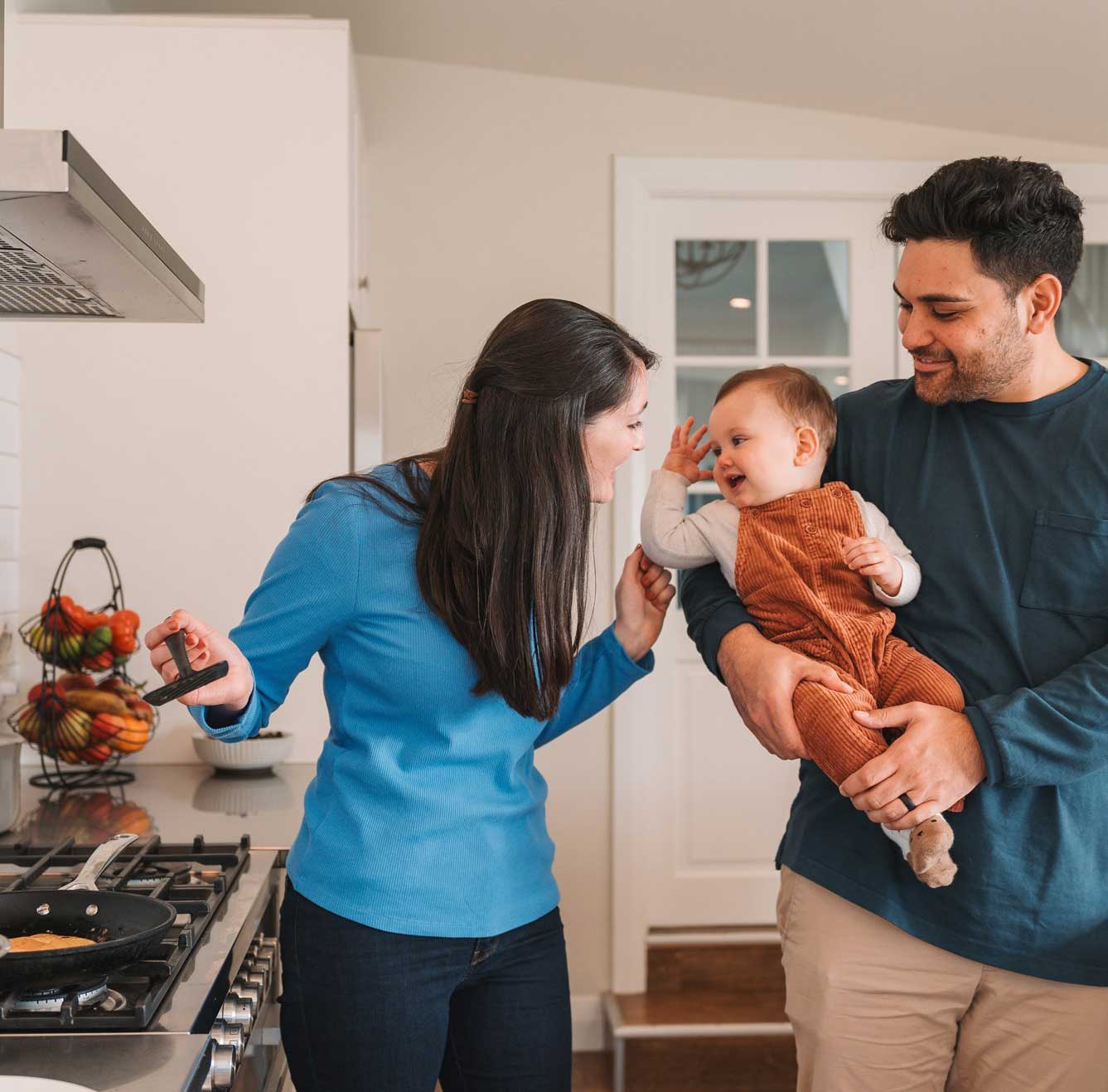 Family cooking in kitchen
