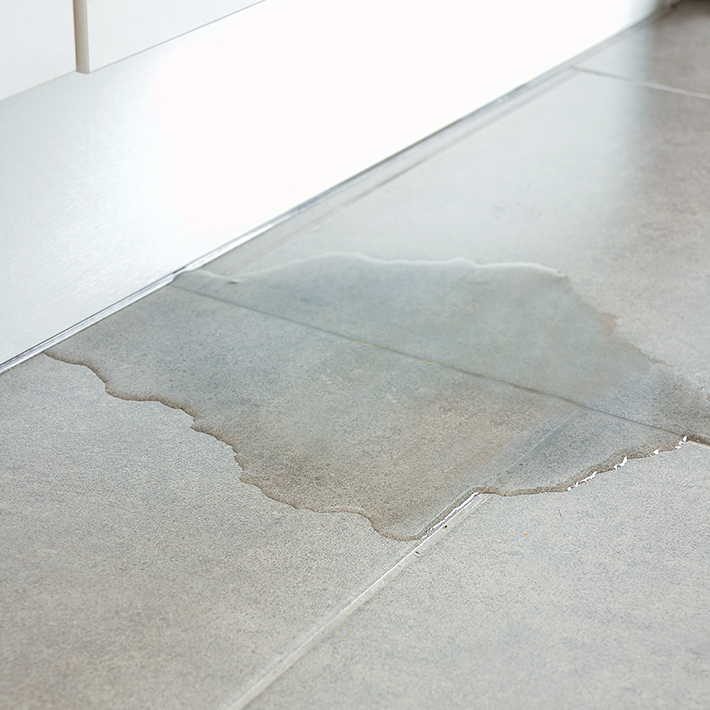 Hot water leaking on floor